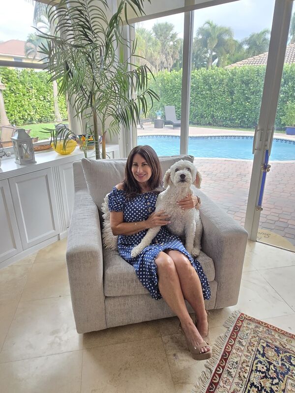 Beth with her dog Zoe on a casual brand day